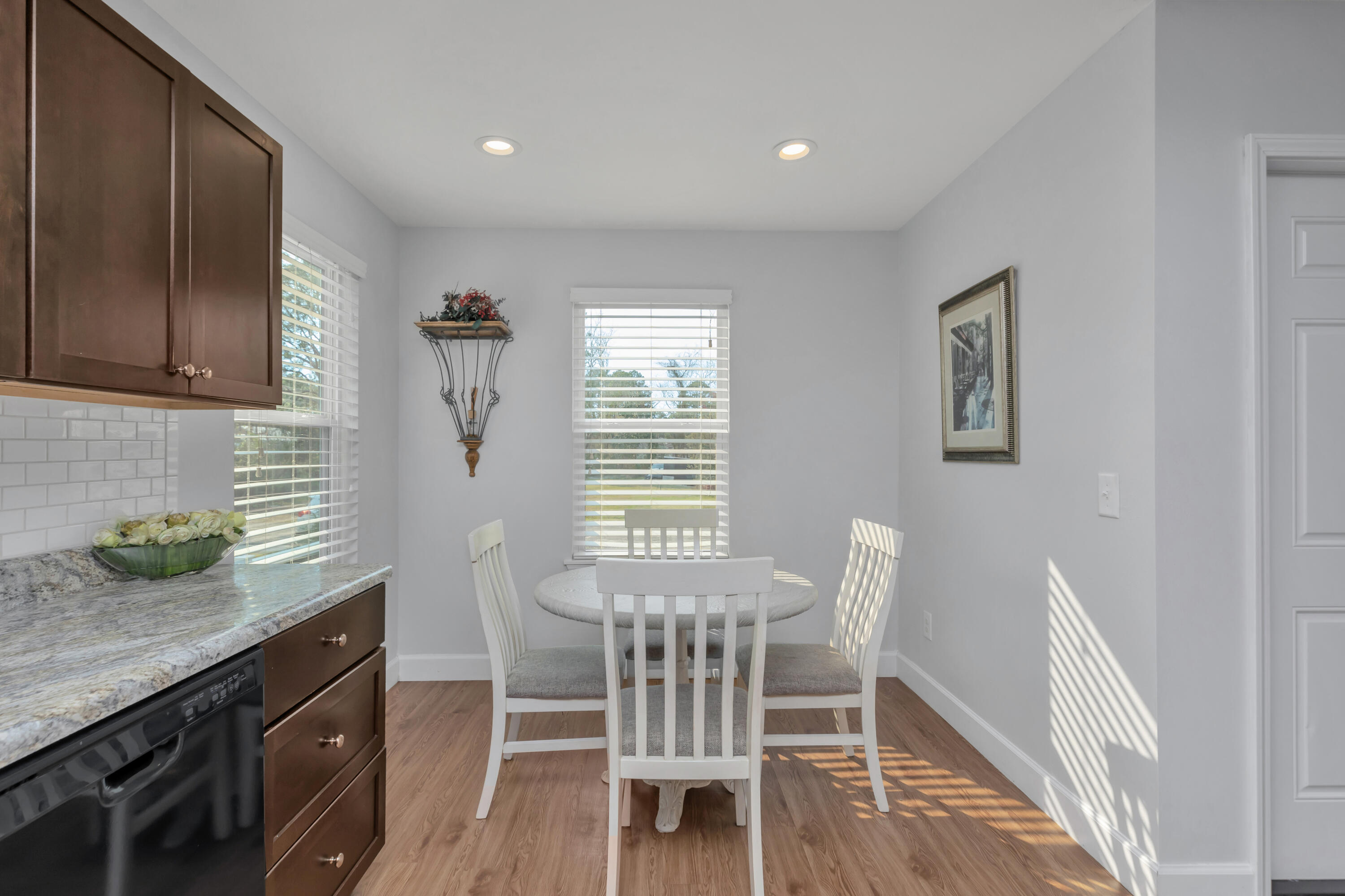 79 6th Street Santa Rosa Beach, FL 32459 - Photo 28 of 42 a view of a kitchen area with furniture and wooden floor