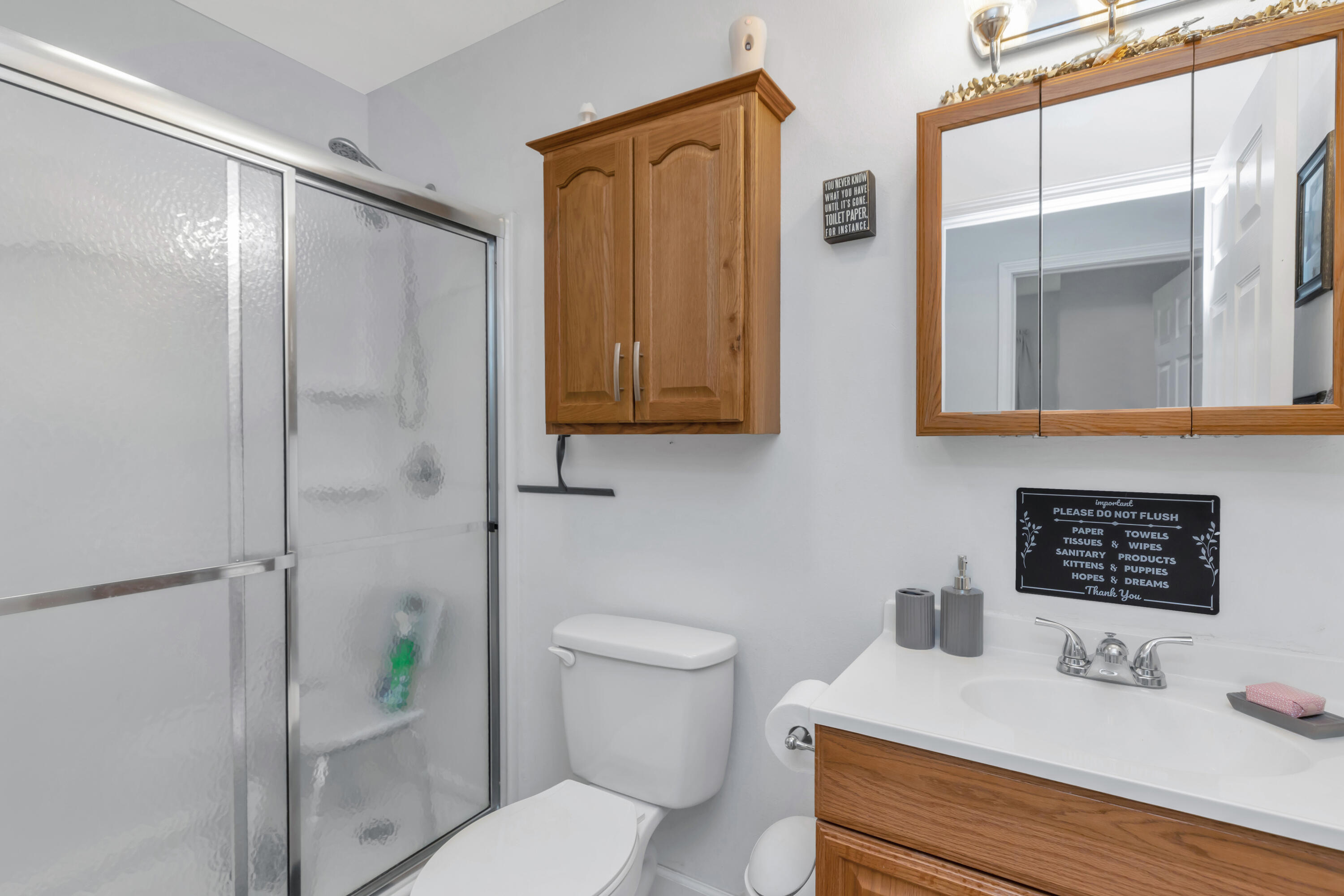 79 6th Street Santa Rosa Beach, FL 32459 - Photo 4 of 42 a bathroom with a sink a toilet and shower