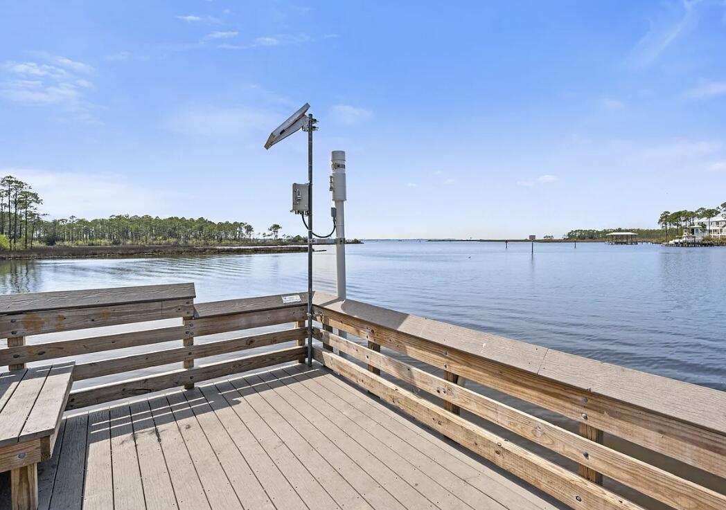 79 6th Street Santa Rosa Beach, FL 32459 - Photo 42 of 42 a view of wooden floor with a lake view