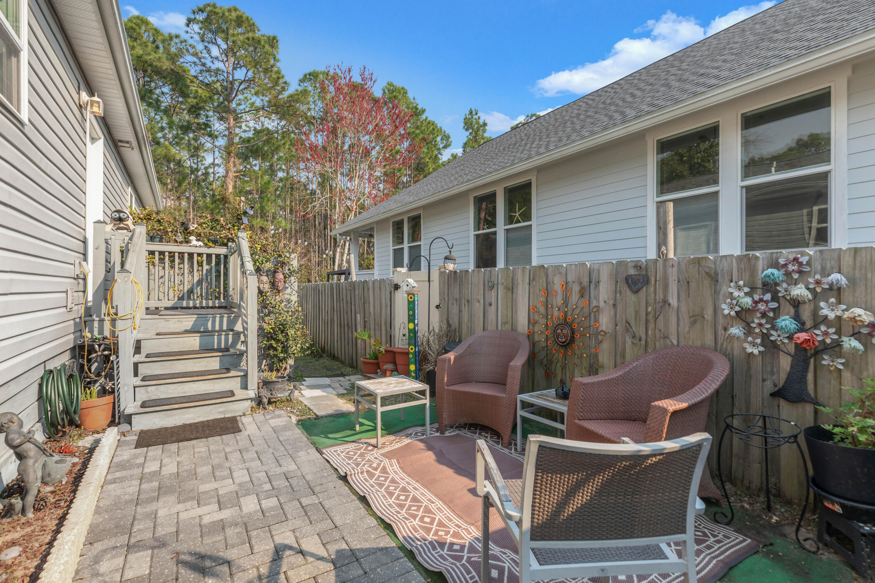 79 6th Street Santa Rosa Beach, FL 32459 - Photo 5 of 42 a backyard of a house with outdoor seating