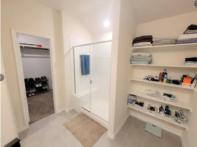 a view of workspace with cabinets