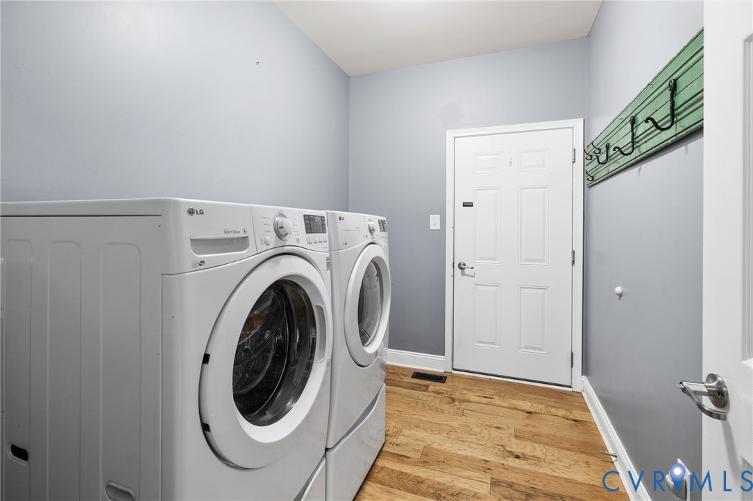 16112 Garston Lane Midlothian, VA 23112 - Photo 20 of 37 a utility room with dryer and washer