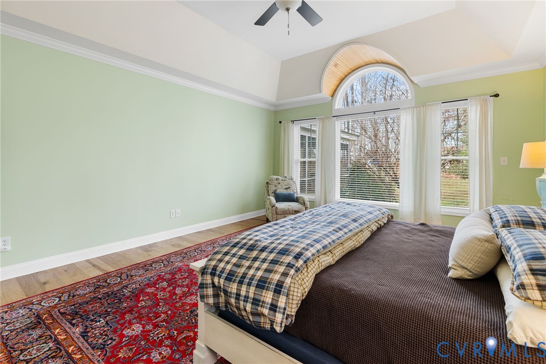 16112 Garston Lane Midlothian, VA 23112 - Photo 21 of 37 a bedroom with a bed and a window