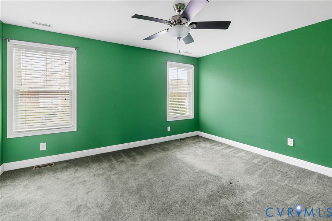 16112 Garston Lane Midlothian, VA 23112 - Photo 27 of 37 a view of an empty room with a window