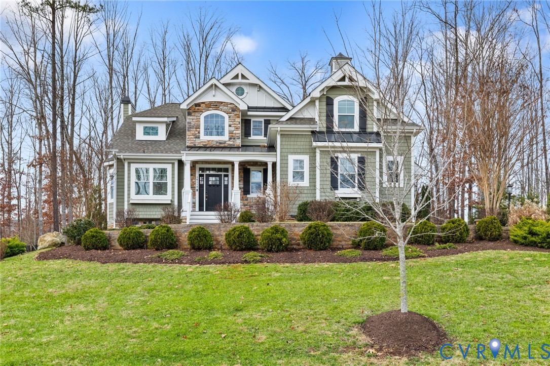 16112 Garston Lane Midlothian, VA 23112 - Photo 36 of 37 a front view of a house with a yard