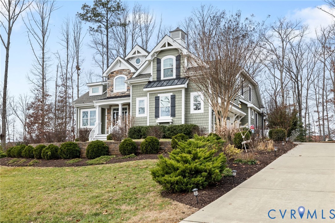 16112 Garston Lane Midlothian, VA 23112 - Photo 37 of 37 a front view of a house with garden