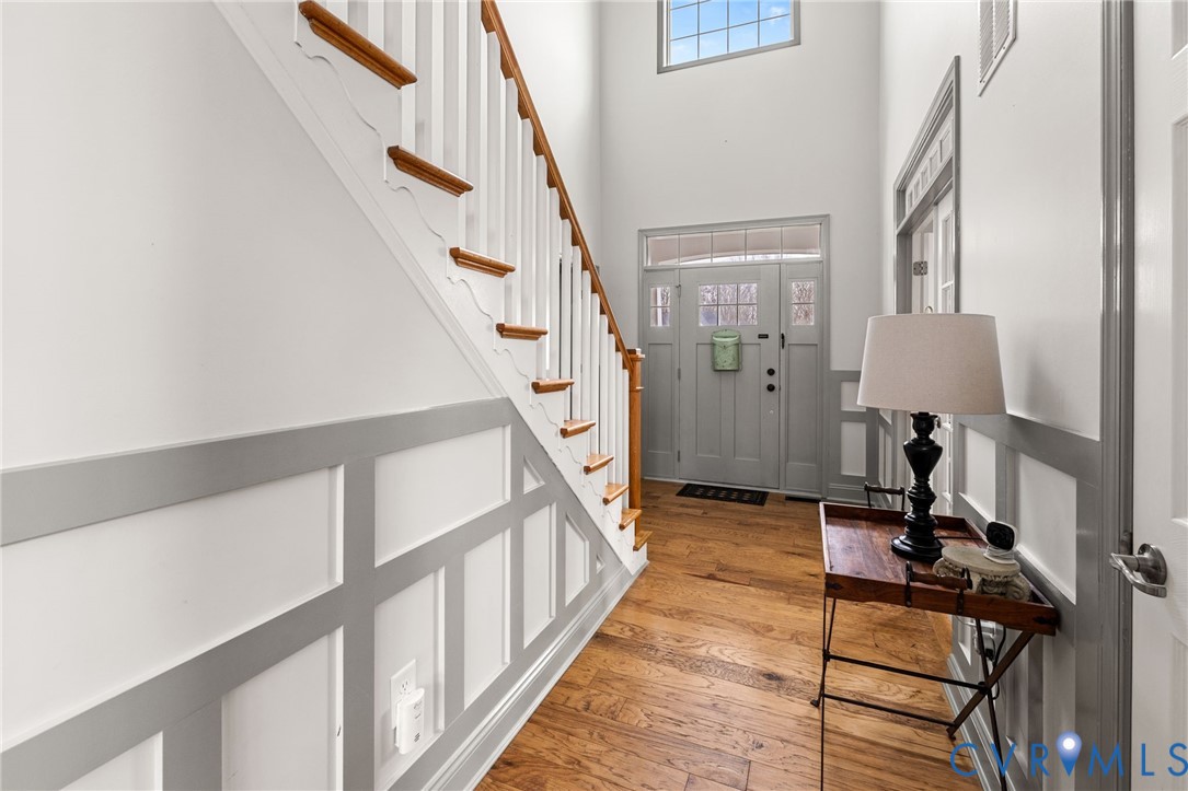 16112 Garston Lane Midlothian, VA 23112 - Photo 10 of 37 a view of entryway and hall with wooden floor