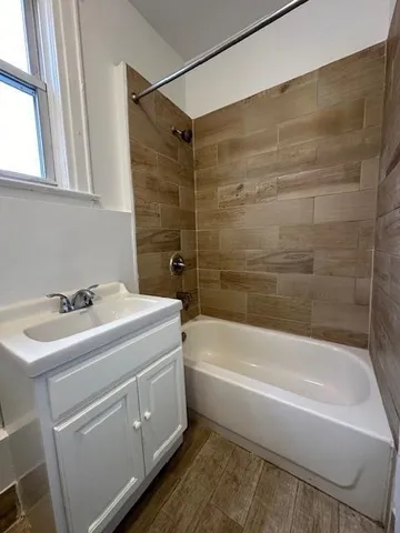 a bathroom with a sink and a bathtub