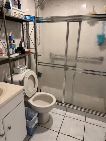 a bathroom with a toilet and a sink