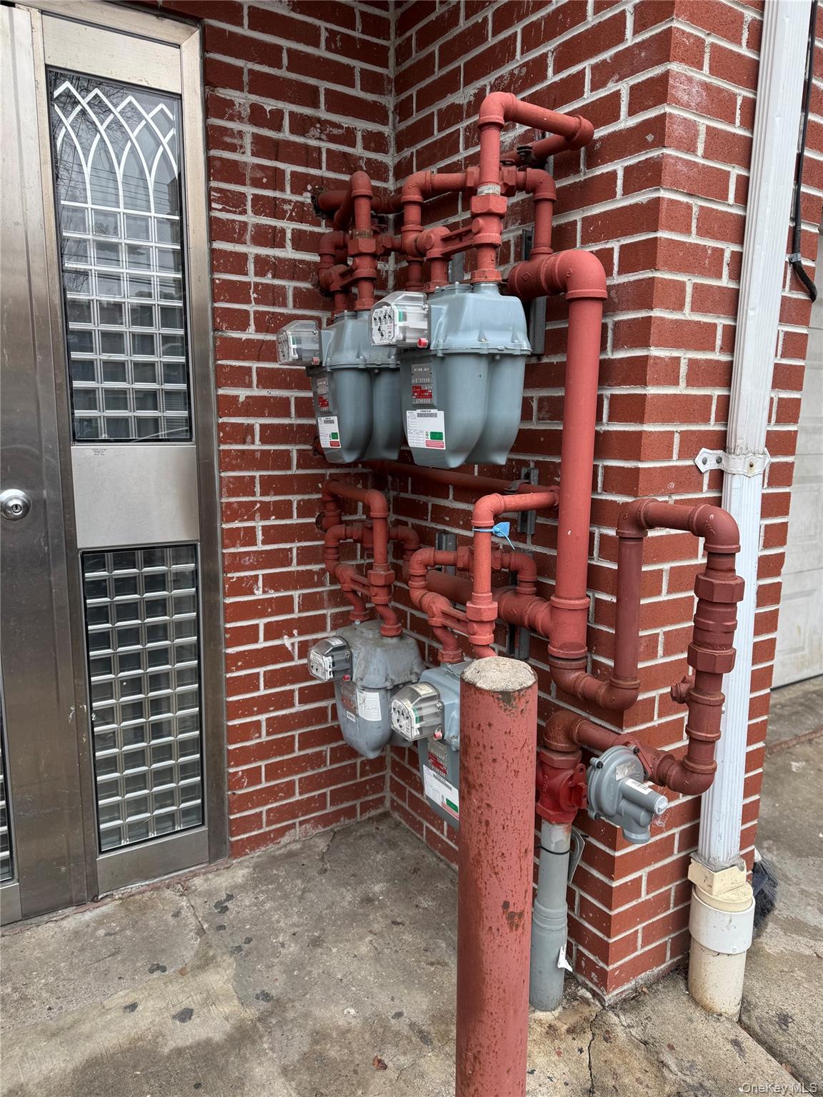 104-37 37th Road Queens, NY 11368 - Photo 6 of 10 a front view of a house with a sink