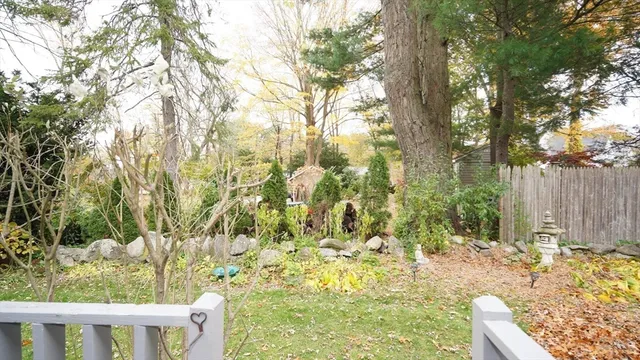 a view of backyard with green space