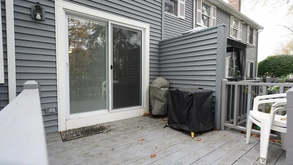a view of storage and utility room with stairs