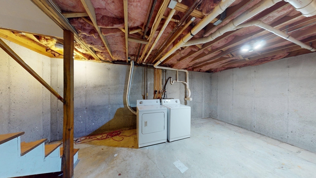64 Mechanic Street, Unit 3 Attleboro, MA 02703 - Photo 38 of 39 a view of storage and utility room with stairs