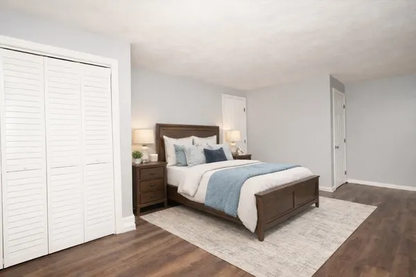 a kitchen with stainless steel appliances a stove microwave and refrigerator