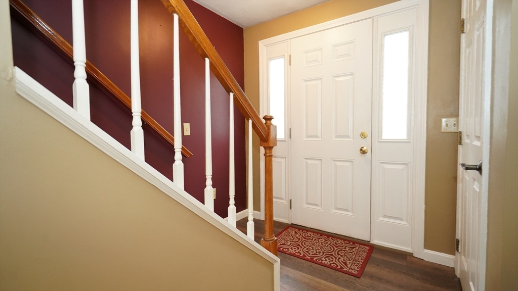 64 Mechanic Street, Unit 3 Attleboro, MA 02703 - Photo 8 of 39 a view of an entryway with wooden floor