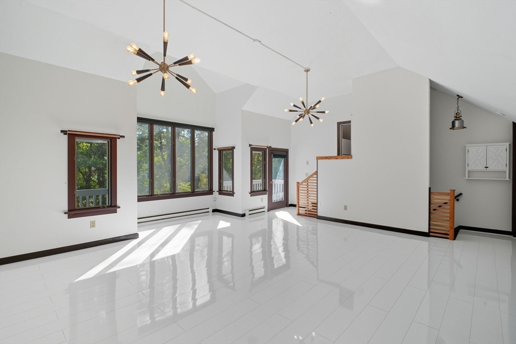 259 Long Plain Road Leverett, MA 01054 - Photo 16 of 39 a view of an empty room with a window