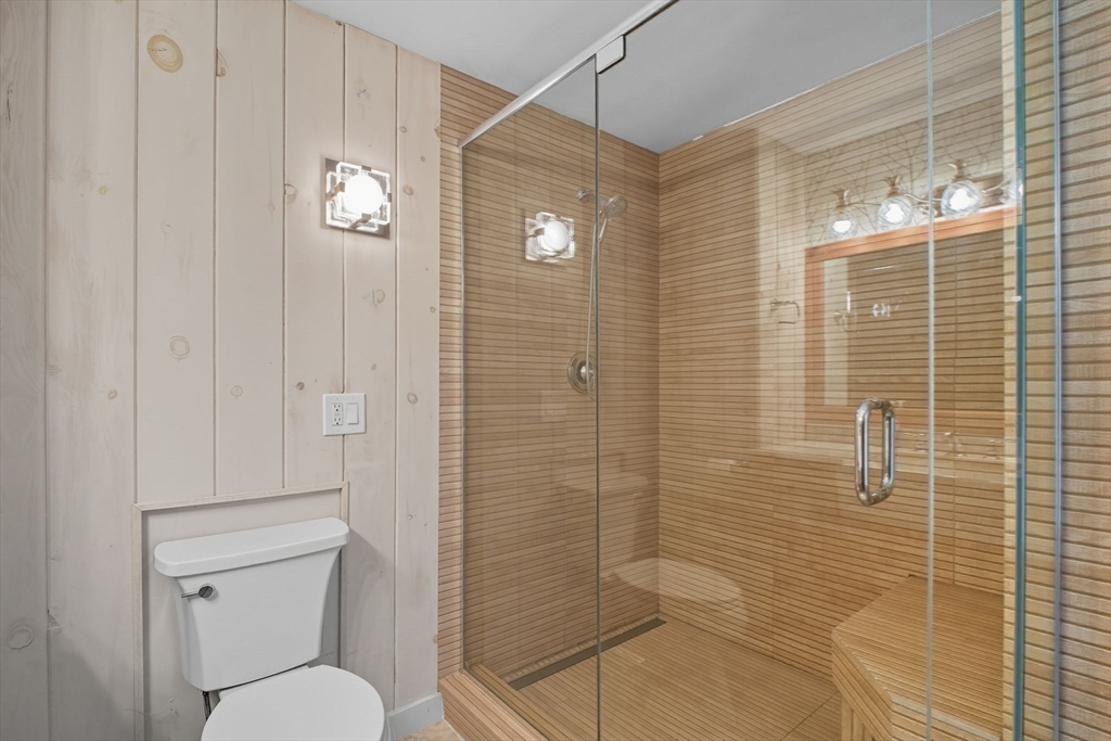 259 Long Plain Road Leverett, MA 01054 - Photo 22 of 39 a bathroom with a shower a toilet and a sink