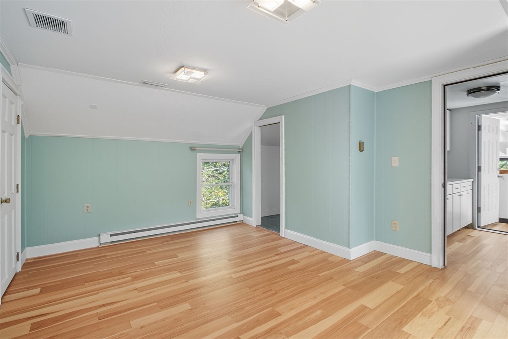 259 Long Plain Road Leverett, MA 01054 - Photo 27 of 39 a view of empty room with wooden floor