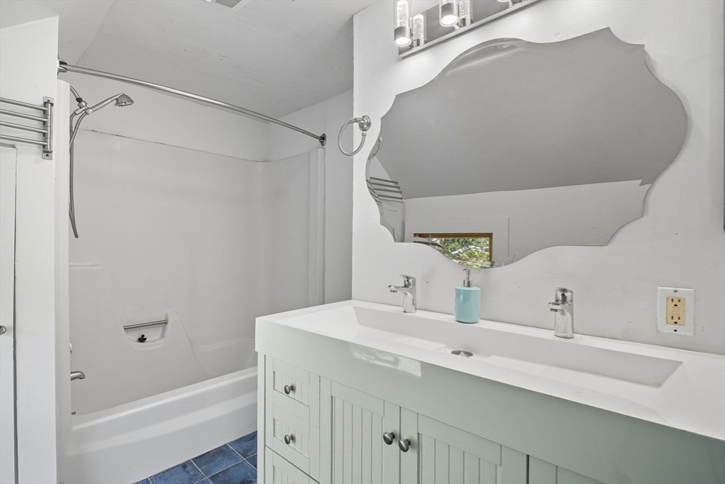 259 Long Plain Road Leverett, MA 01054 - Photo 29 of 39 a bathroom with a sink and a mirror