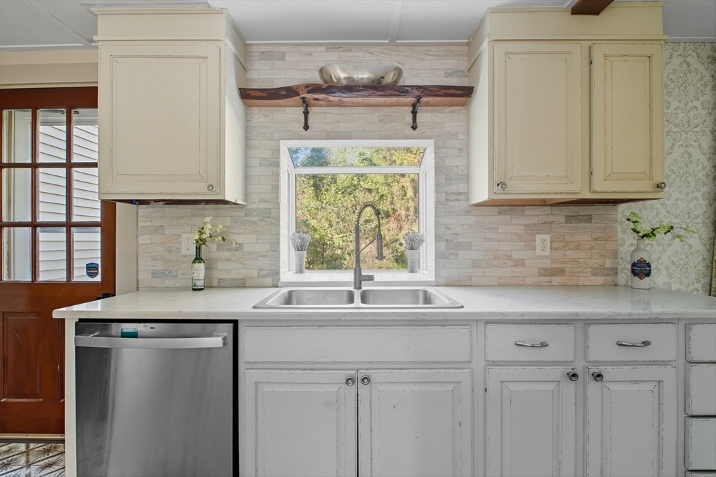 259 Long Plain Road Leverett, MA 01054 - Photo 10 of 39 a kitchen with a sink and cabinets