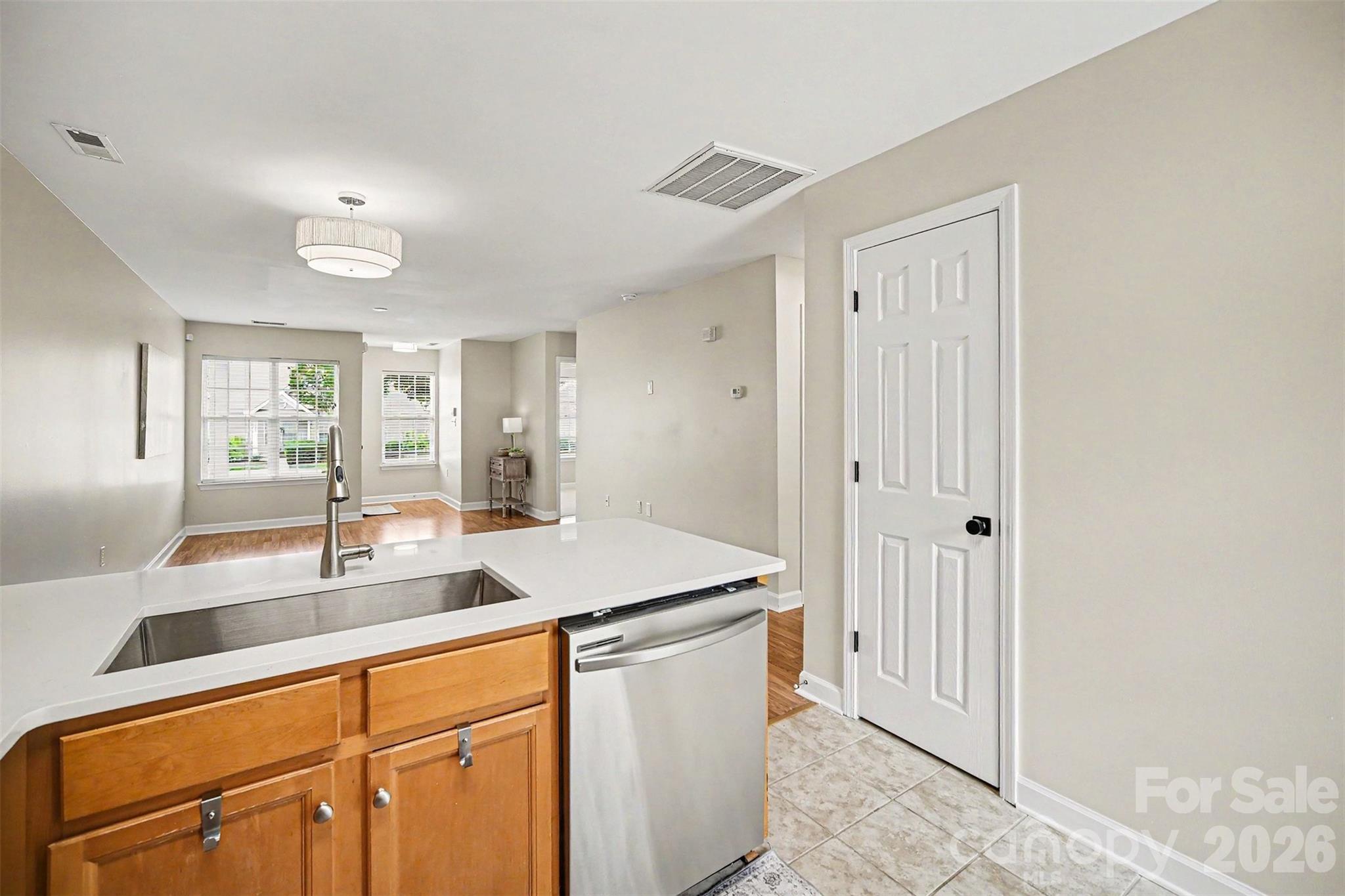 1210 Sheldon Brook Lane Fort Mill, SC 29707 - Photo 5 of 26 a kitchen with a sink and cabinets
