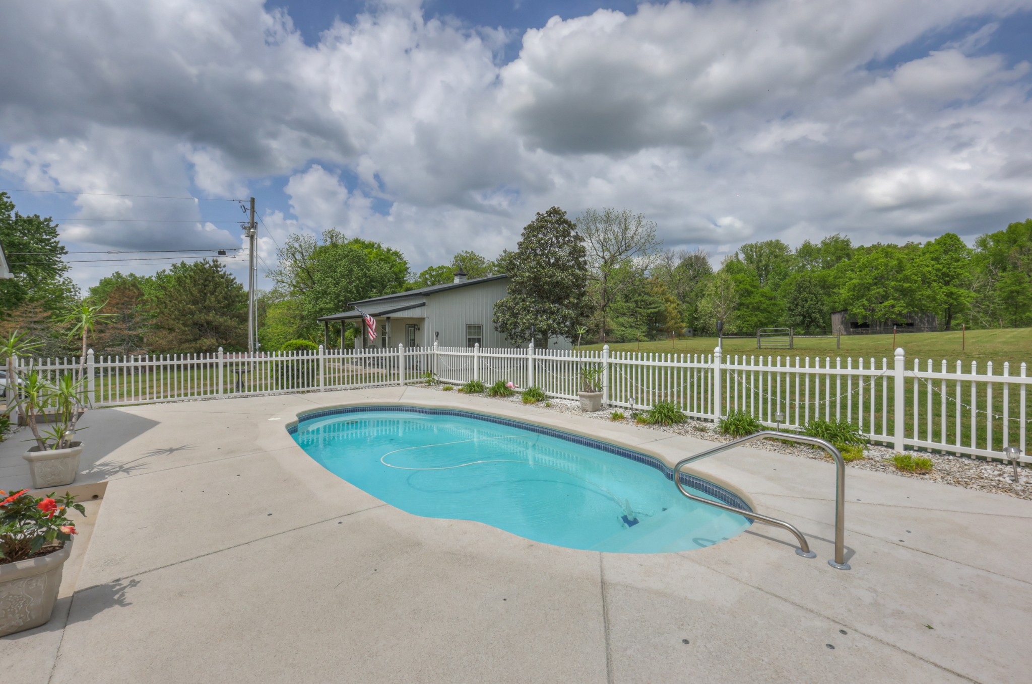590 Allisona Road Eagleville, TN 37060 - Photo 32 of 55 a view of a backyard with a small pool