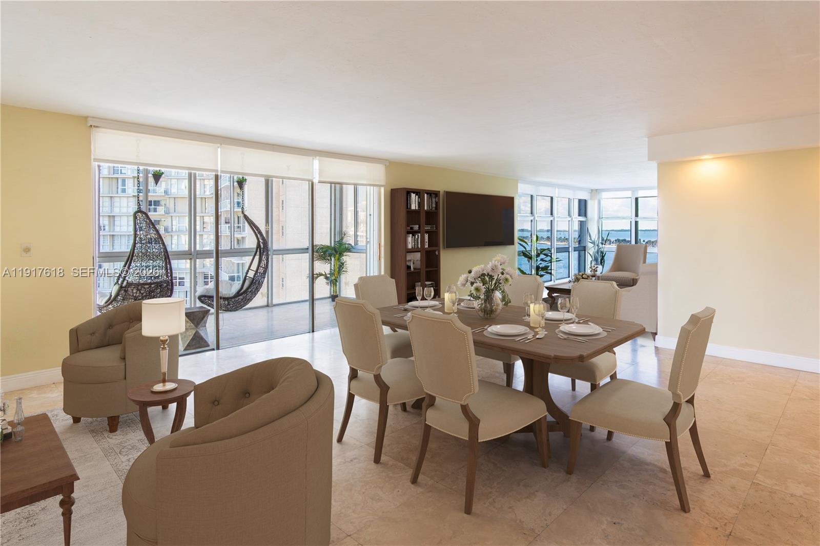 145 Southeast 25th Road, Unit 1003 Miami, FL 33129 - Photo 12 of 43 a view of a dining room with furniture window and outside view