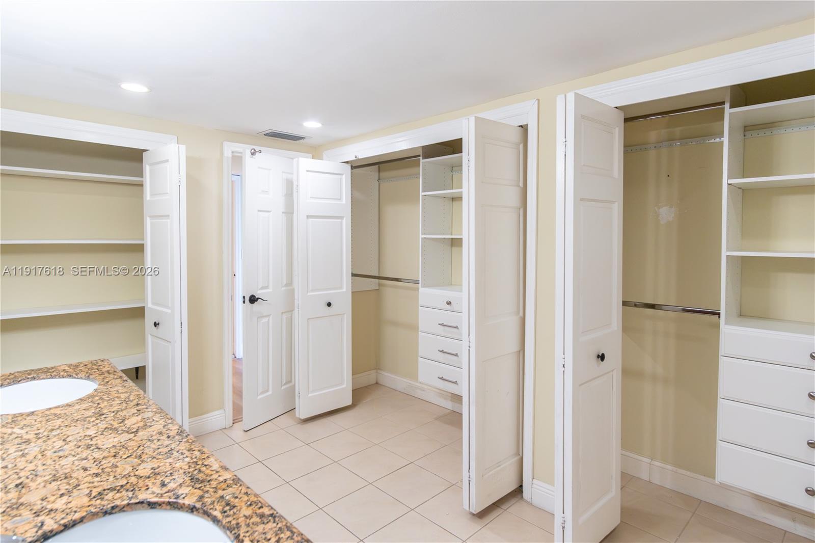 145 Southeast 25th Road, Unit 1003 Miami, FL 33129 - Photo 23 of 43 a bathroom with a bathtub and a shower