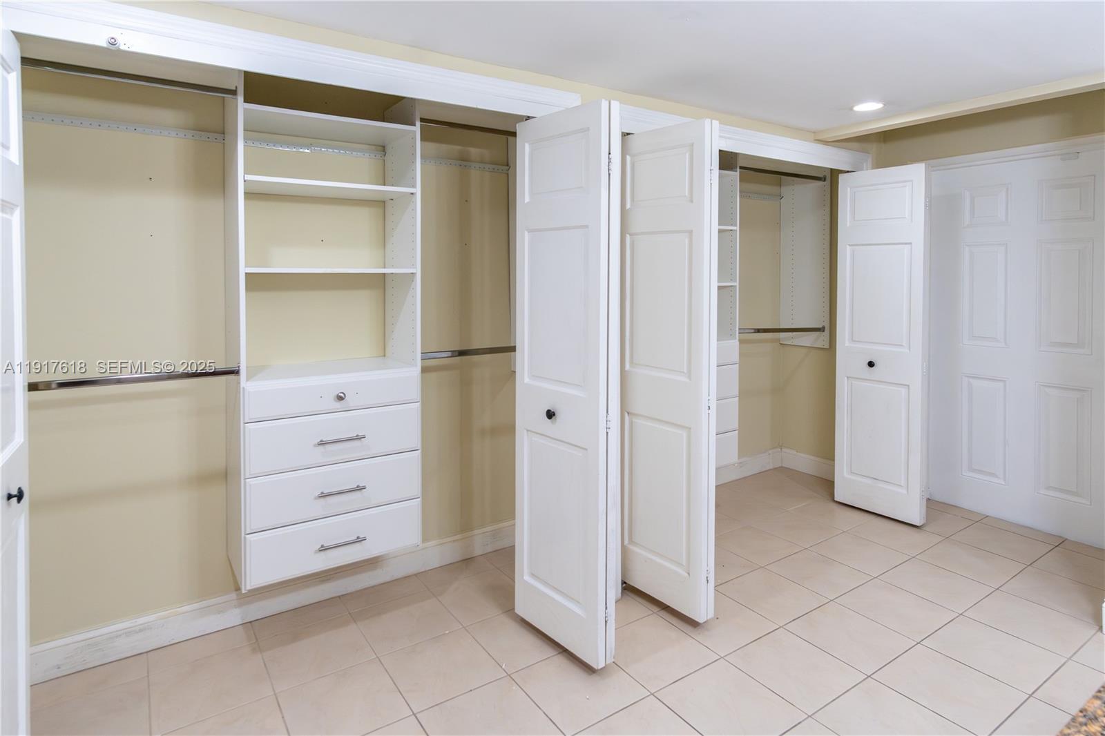 145 Southeast 25th Road, Unit 1003 Miami, FL 33129 - Photo 25 of 43 a view of closet area