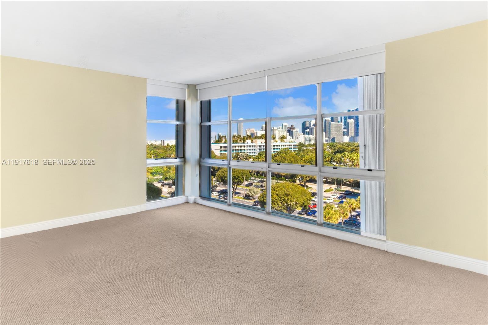 145 Southeast 25th Road, Unit 1003 Miami, FL 33129 - Photo 36 of 43 a view of an empty room with a window