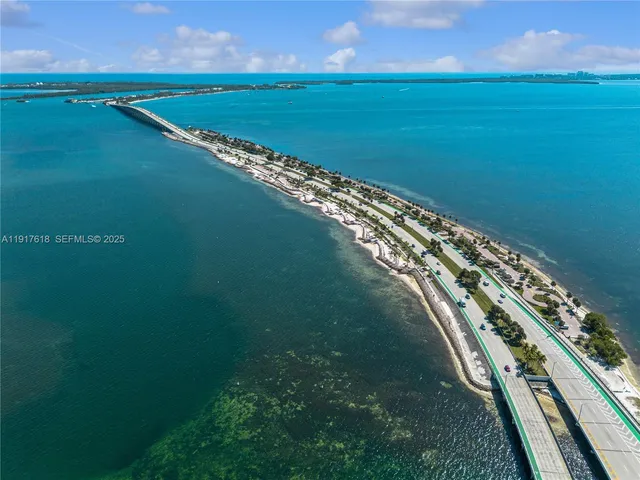a view of a swimming pool with a lounge chairs