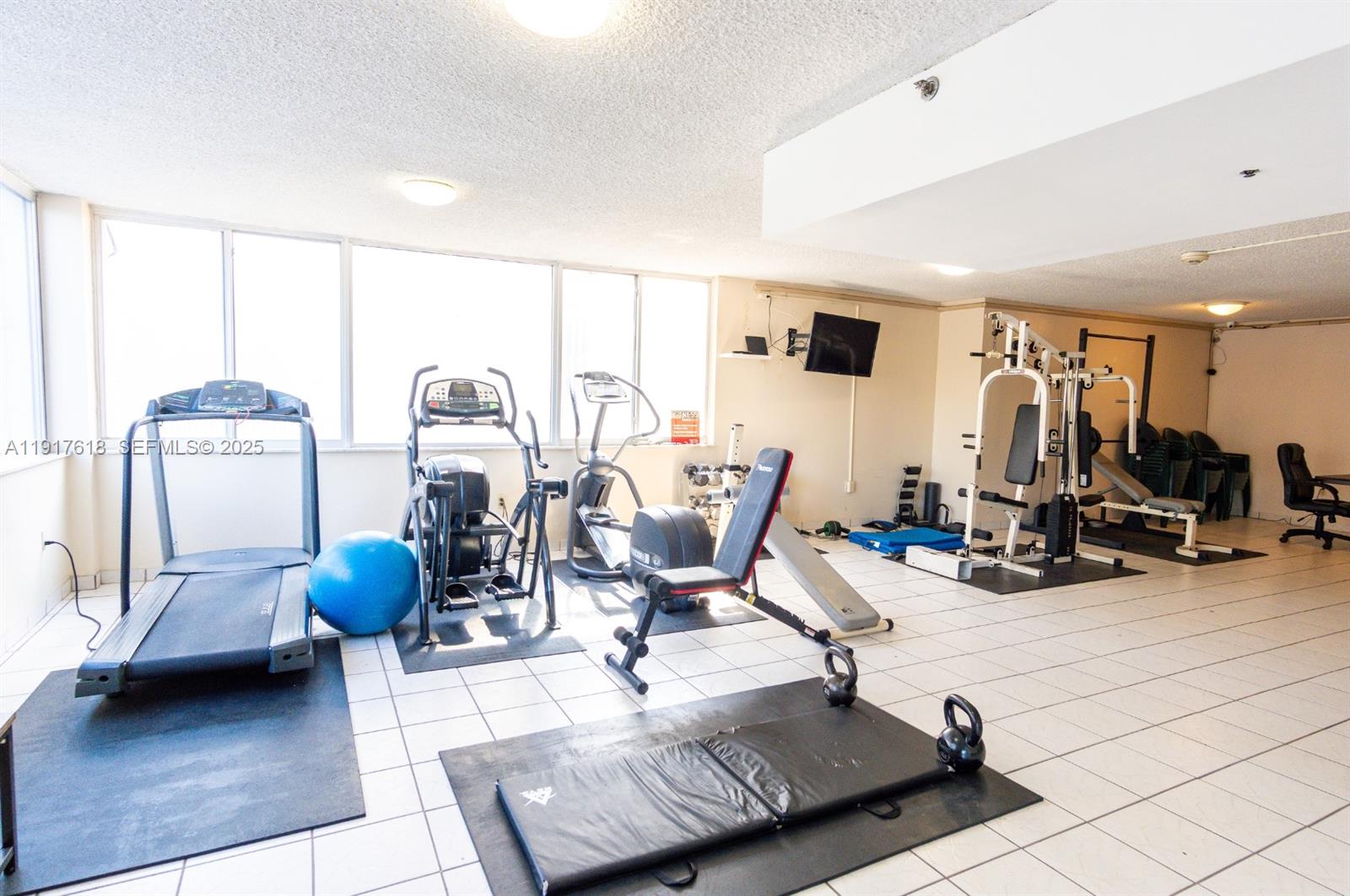 145 Southeast 25th Road, Unit 1003 Miami, FL 33129 - Photo 42 of 43 a view of a livingroom with furniture and a view of living room