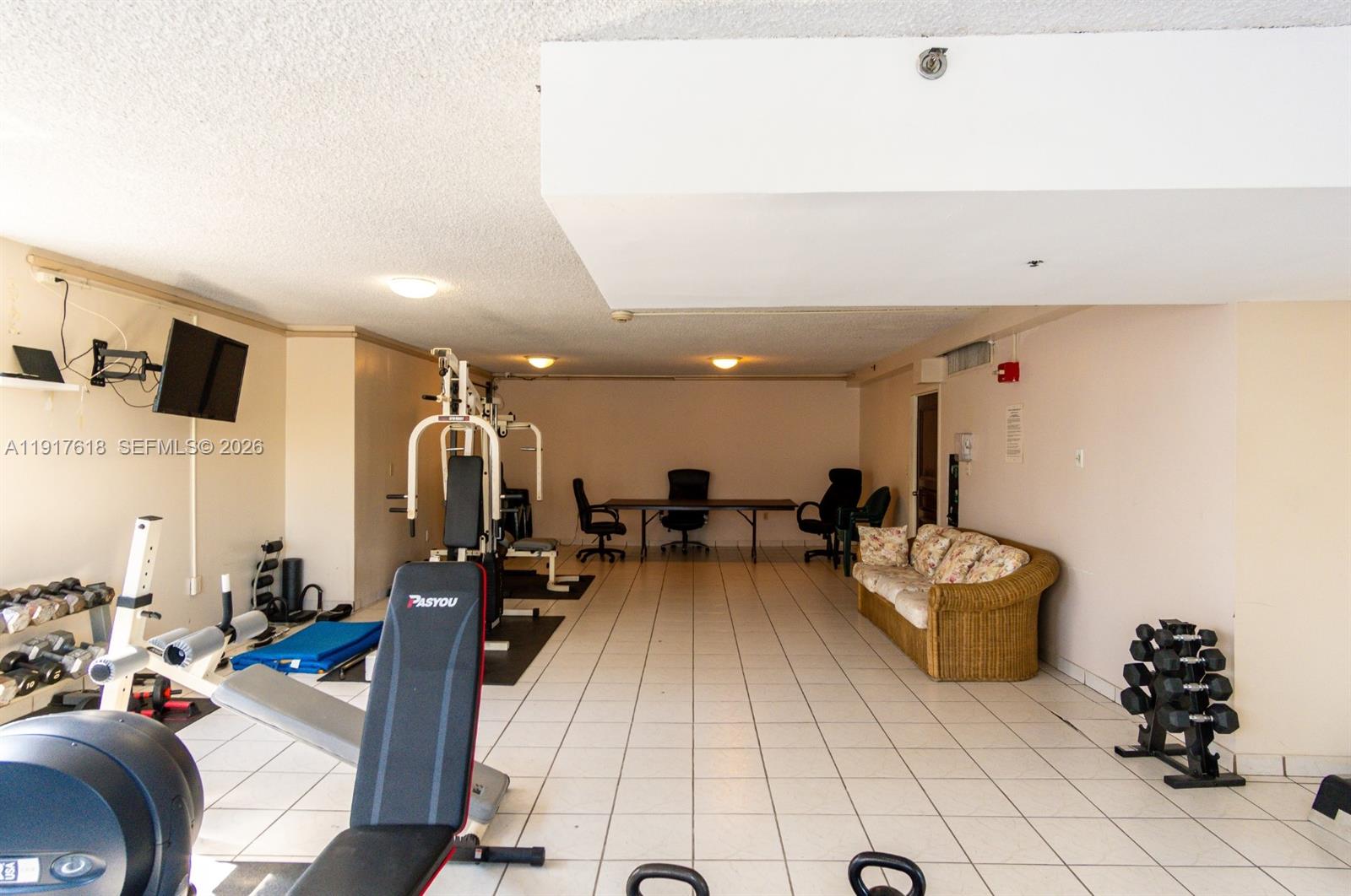 145 Southeast 25th Road, Unit 1003 Miami, FL 33129 - Photo 43 of 43 a living room with furniture