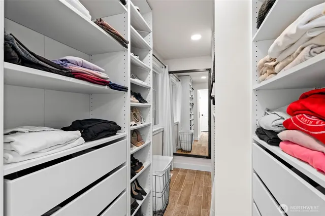 a kitchen with a stove and a white refrigerator