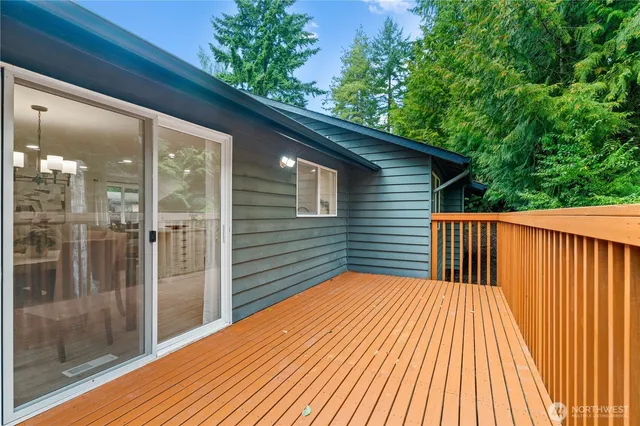 a view of backyard with a balcony