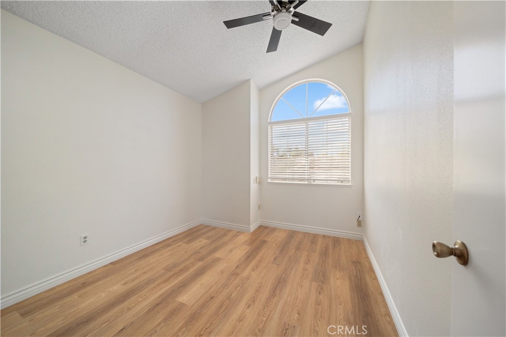 19422 Totem Court Riverside, CA 92508 - Photo 24 of 38 wooden floor in an empty room with a window