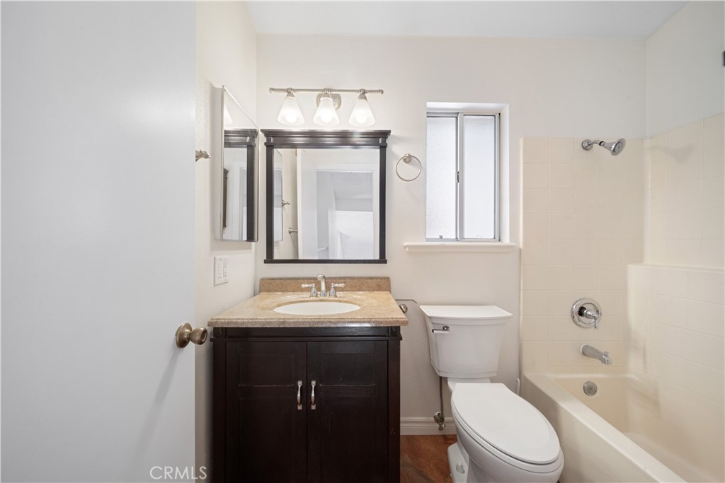19422 Totem Court Riverside, CA 92508 - Photo 28 of 38 a bathroom with a sink a toilet and shower