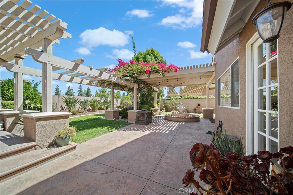 19422 Totem Court Riverside, CA 92508 - Photo 34 of 38 a group of people sitting in front of a building