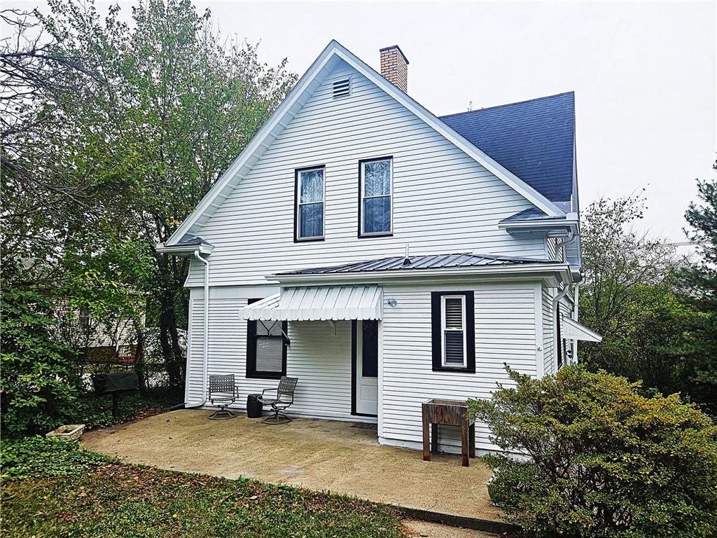 10361 Washington Avenue Irwin, PA 15642 - Photo 2 of 37 a view of a house with yard and sitting area