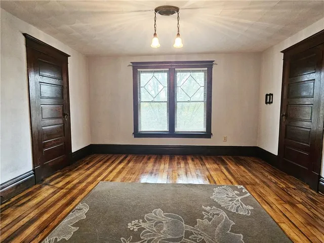 a view of an empty room and window