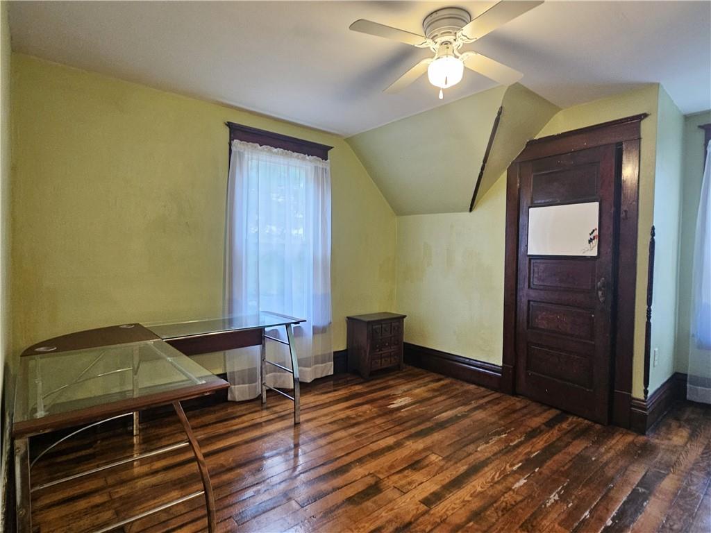 10361 Washington Avenue Irwin, PA 15642 - Photo 29 of 37 a bedroom with a bed and a chandelier