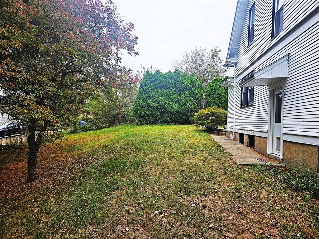 10361 Washington Avenue Irwin, PA 15642 - Photo 37 of 37 a view of a house with a yard
