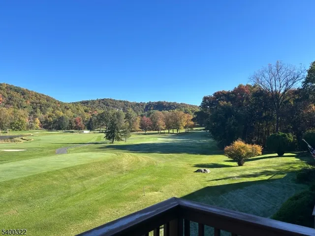 a view of a lake with a yard