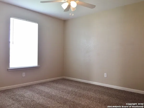 an empty room with a window