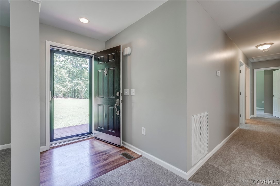 3759 Broad St Road Gum Spring, VA 23065 - Photo 13 of 33 an empty room with wooden floor and windows