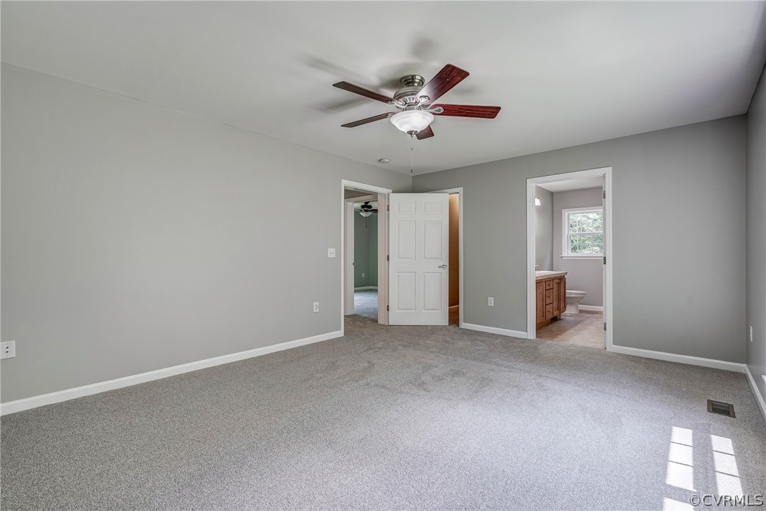 3759 Broad St Road Gum Spring, VA 23065 - Photo 31 of 33 a view of a livingroom with a ceiling fan and window