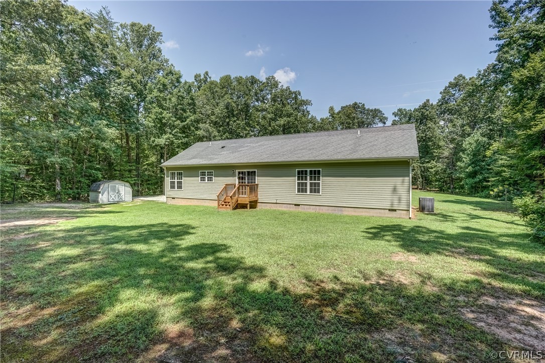 3759 Broad St Road Gum Spring, VA 23065 - Photo 10 of 33 a view of a house with a backyard