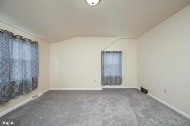 an empty room with sliding door