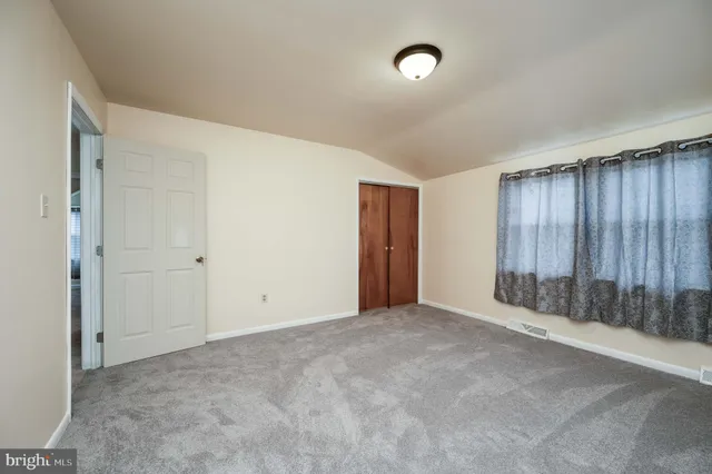 an empty room with a window