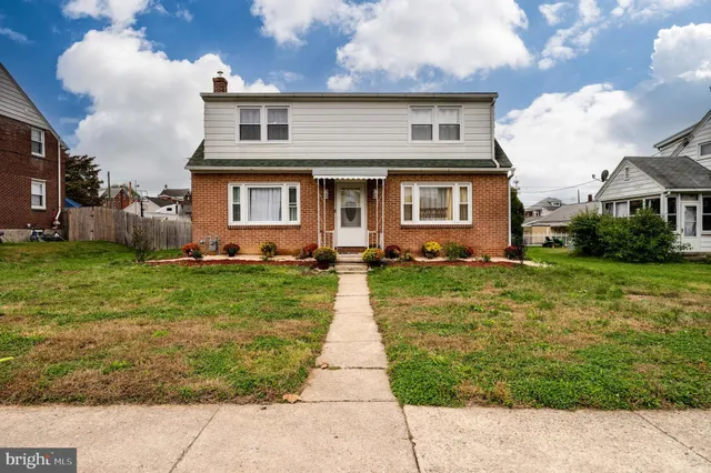 a front view of house with yard